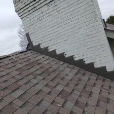 counter-flash-chimney-spraying-brick-chimney-with-sealer-carmel-in 0